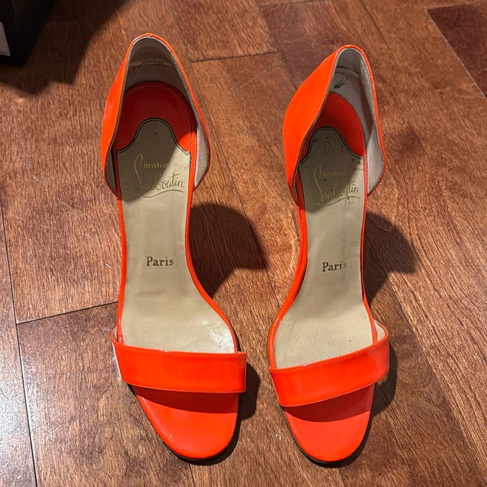 Christian Louboutin, neon orange heels